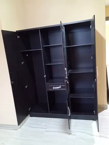 Large Black 3-Door Wardrobe with Multiple Shelves and Drawer