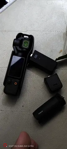 DJI Pocket 3 handheld gimbal camera with accessories - good condition