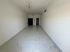 2BHK apartment Al Jurf 3 Ajman main road balcony central AC new building AED 42K yearly 6 cheques
