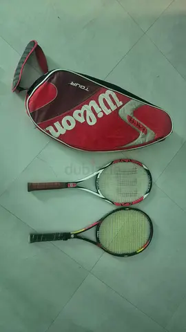 Two used tennis rackets with Wilson cover — good for practice