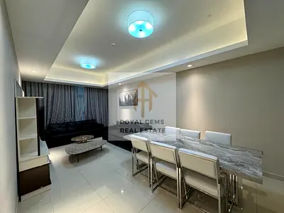 Furnished apartment with two bedrooms and a living room, clean and modern furnishings.