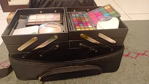 Makeup Train Case with Assorted Eye Shadow  Face Palettes.