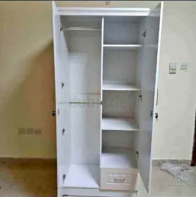 Brand NEW Two Door wardrobe with Shelves and Drawers