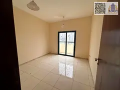 Elegant Two Bedroom Apartment with Spacious Living Room Two Bathrooms Balcony and Central AC in a Pr