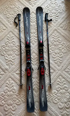 Pair of downhill alpine skis with bindings and poles — used, good condition