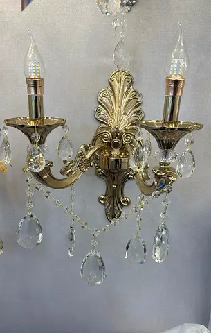 Antique-style crystal wall sconce (2-arm) – brass finish