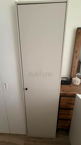 Slim tall storage cabinet / wardrobe - neutral beige, good condition