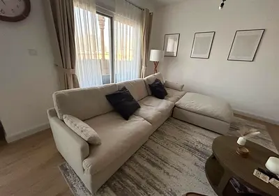 Home Center swin feather filled sofa with footstool