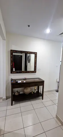 Wooden console table with decorative mirror - good condition