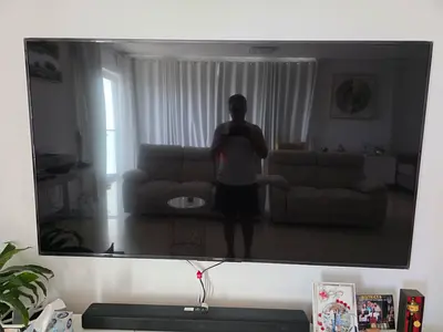 75 Inches Sony TV and 2.1 Sony wireless speaker with woofer and IKEA TV stand