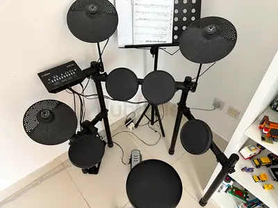 Compact electronic drum kit with cymbals and module - good condition