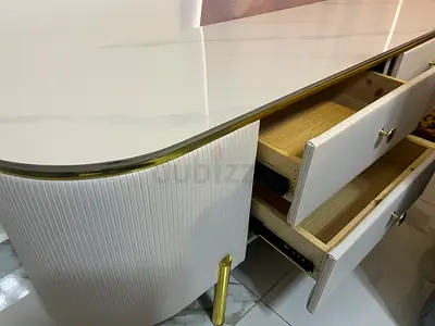 TV console/sideboard with gold legs and six drawers