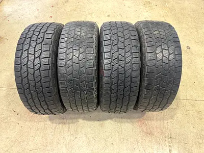 4x 285/70/17 Cooper at3 4s