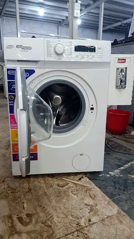 White Front-Load Washing Machine - Good Working Condition