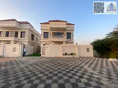 Modern two-story family villa with a majlis and roof access