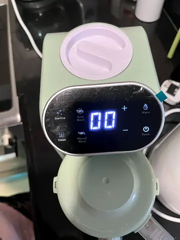 Moving out Sale - Electric Baby Bottle Warmer / Sterilizer (Light Green) - like new