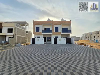 Villa for sale in Ajman, including registration, water, and electricity.