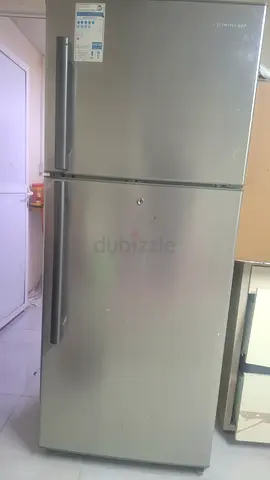 Silver double-door refrigerator - good working condition