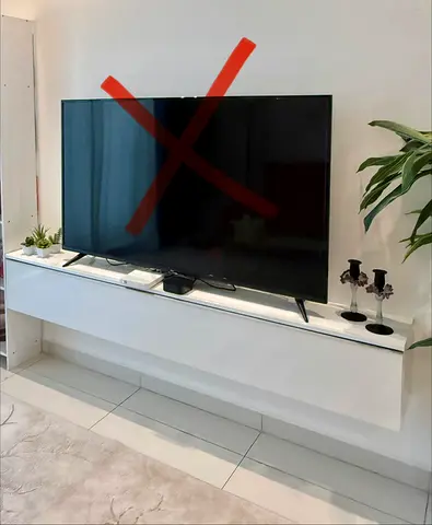 White TV table with storage - wall mounted