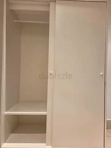 White Sliding Door Wardrobe / Armoire - Compact Storage