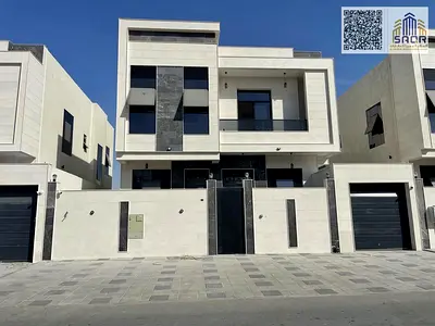 Two Villas for Sale in Ajman – Al Bahia Area Two adjacent villas for sale in a very prime location in Al Bahia, Ajman. Each villa consists of: • 5 master bedrooms • Majlis • Living room • Maid’s room
