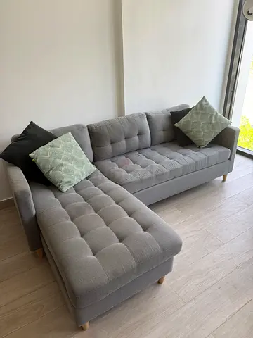 Light Grey L-shaped Sofa with Cushions - Good Condition