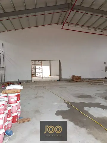 Two warehouses available for rent in Emirates Modern Industrial Area (Umm Al Durra). Total area 10,200 sq ft, with 5,100 sq ft for each warehouse. To