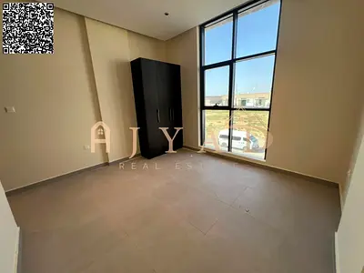 1 month free! Stunning 2BR hall in Al Jurf 3, Ajman, wardrobes, balcony, 2 baths, central AC, prime location, easy Dubai exit.