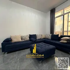 Furnished two-bedroom apartment with new furniture for monthly rent in Ajman - Al Rashidiya 2 - next