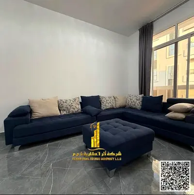 Furnished two-bedroom apartment with new furniture for monthly rent in Ajman - Al Rashidiya 2 - next to Al Rashidiya Park