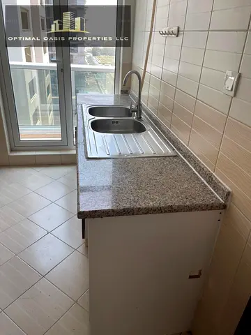 Unfurnished 1BR | Chiller Free | Closed Kitchen | Mid Floor |