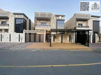Luxury villa for sale in Al Bahia, modern design, price includes electricity, water, and air conditioning.