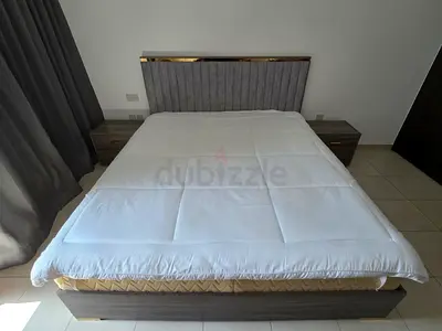 Queen bed frame with headboard, premium mattress,  matching bedside tables and dressing table.
