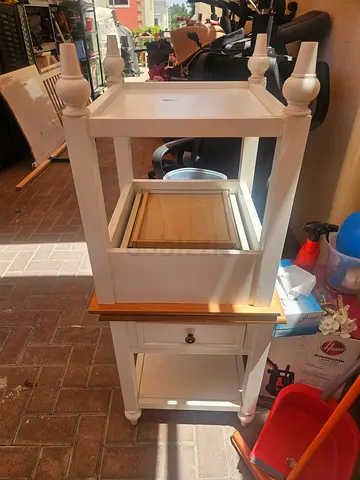 A pair White wooden kitchen island/cart with storage and drawer — good condition