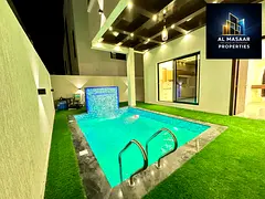 Excellent villa in Al Bahia area, Ajman, with a private pool, distinctive design, freehold ownership