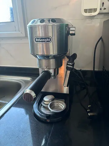 DeLonghi Coffee Machine with Milk Steamer