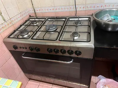6-Burner Stainless Steel Gas Cooker with Oven - Good Working Condition