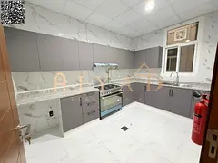 Brand-new 2BR hall for annual rent in Al Mowaihat 3, 1 month free, central AC &amp; gas, big kitchen