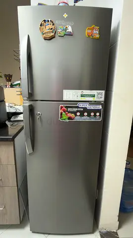 Silver Top-Freezer Refrigerator - Good Working Condition