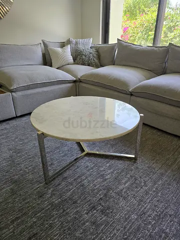 Marina Home Round marble-top coffee table with metal frame