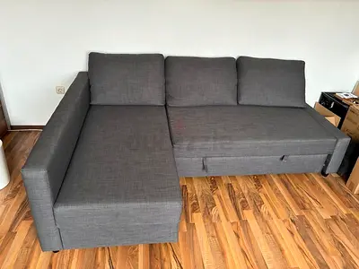 Gray L-shaped Sofa Bed with Storage — Good Condition