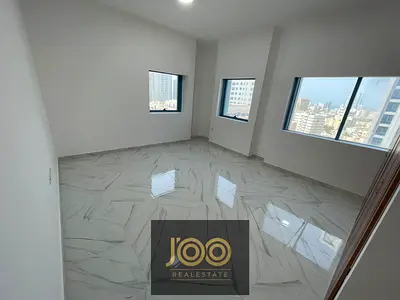 Two-bedroom apartment with a living hall available for annual rent in Al Nuaimiya 3, directly located on Sheikh Khalifa Bin Zayed Road.