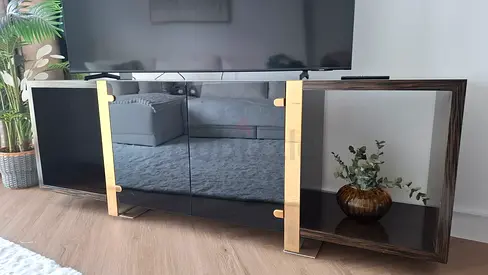 High End Black TV cabinet / entertainment unit with metal gold accents