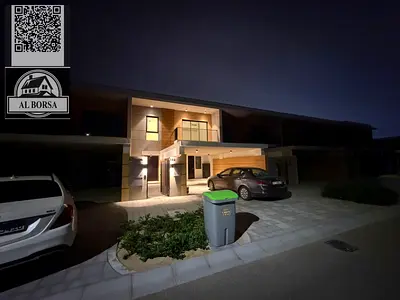 Townhouse in Azha Compound, 4 bedrooms, living room, and majlis. Land area 4000 sq m, built-up area 3200 sq m. Private parking for the villa.
