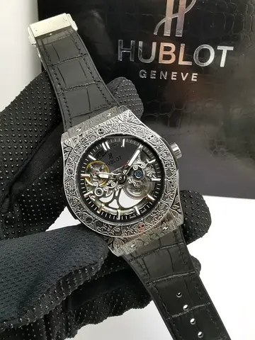 Hublot Skeleton Engraved Case Mens Master Copy Watch with Black Leather Strap