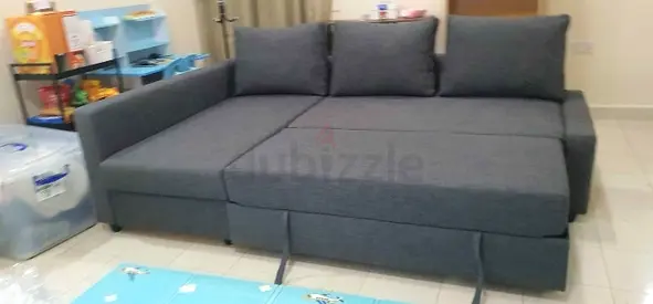 Grey L-shaped Sofa Bed with Storage - Good Condition