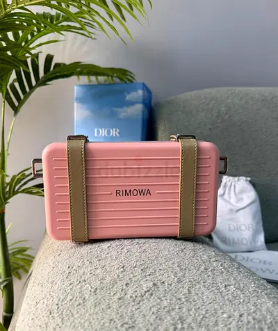 DIOR/Christian Dior and Rimowa