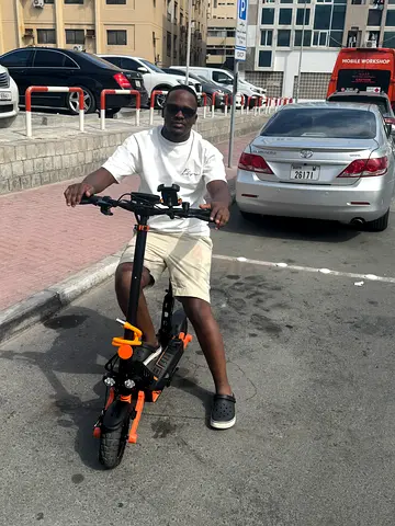 Used Adult Electric Scooter in Good Condition - Orange/Black
