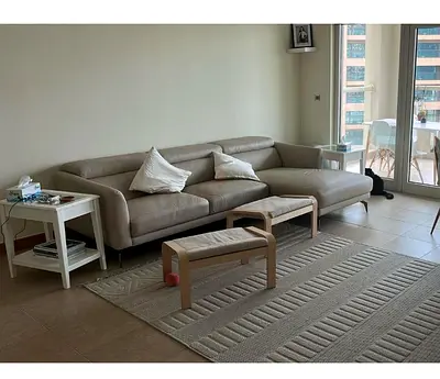 Light grey leather L-shaped sofa
