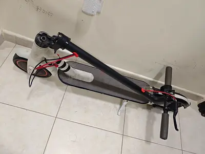 Used white electric scooter - foldable, needs new battery